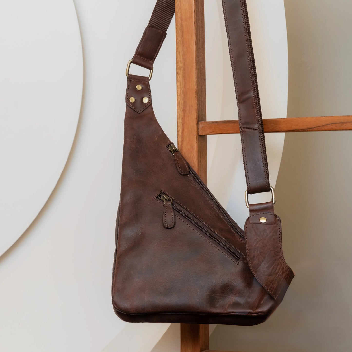 Mooving Along Leather Sling Purse