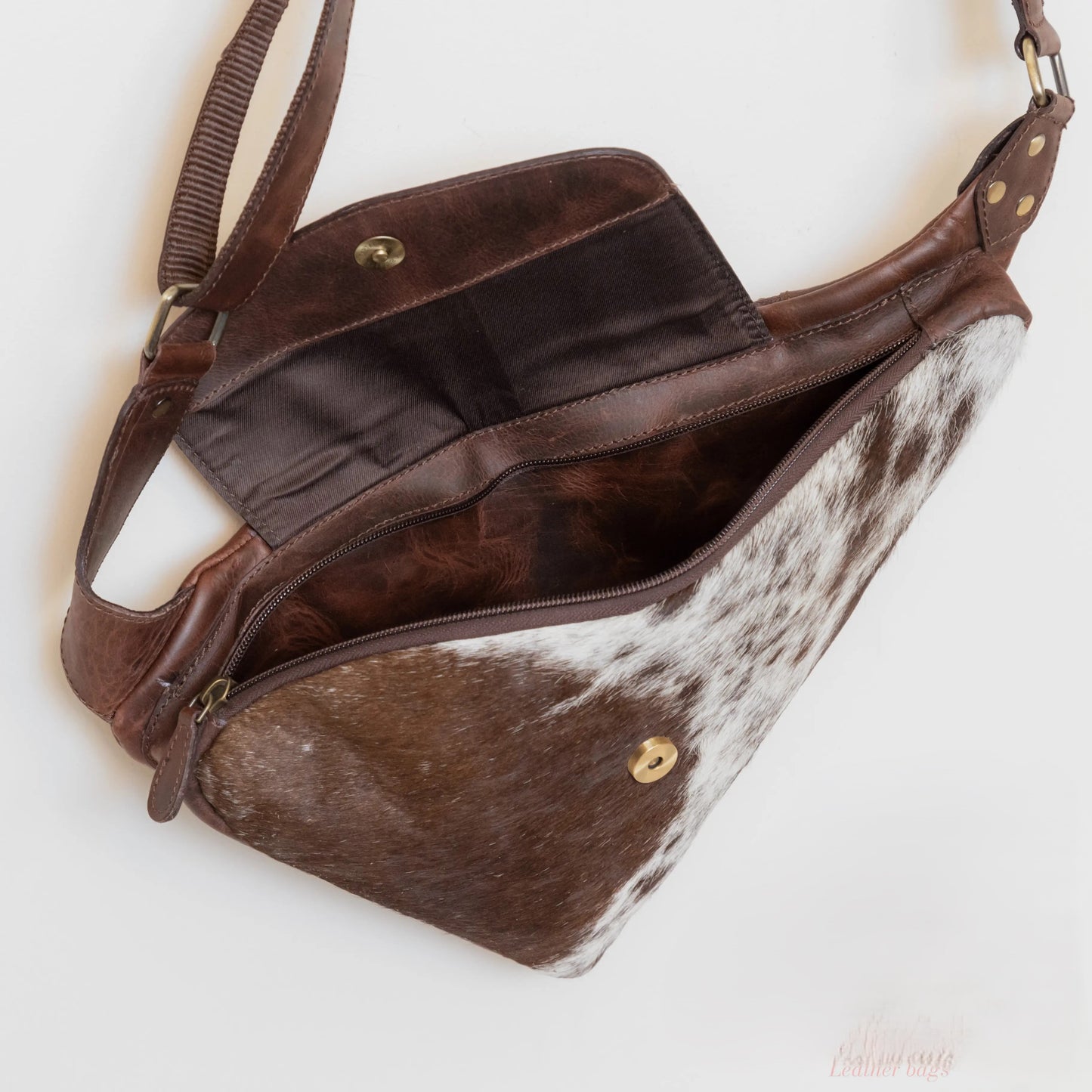 Mooving Along Leather Sling Purse